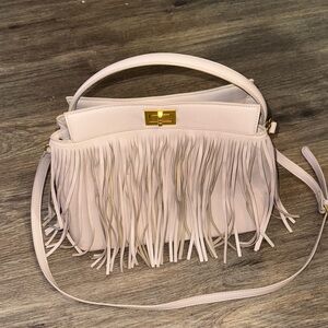 Melie Bianco Fringe Vegan Leather handbag with crossbody strap